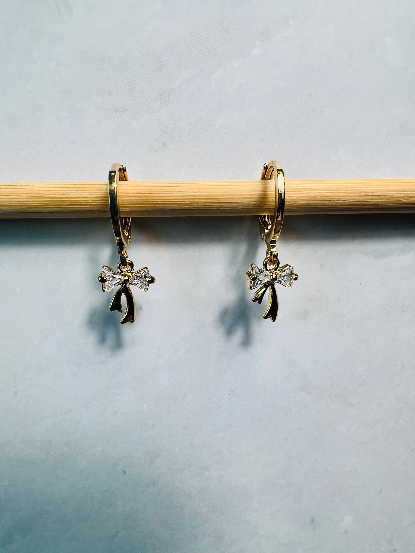 Gold Huggie Earrings with CZ Bow Charms, Dainty Coquette Jewelry, Ribbon Earrings