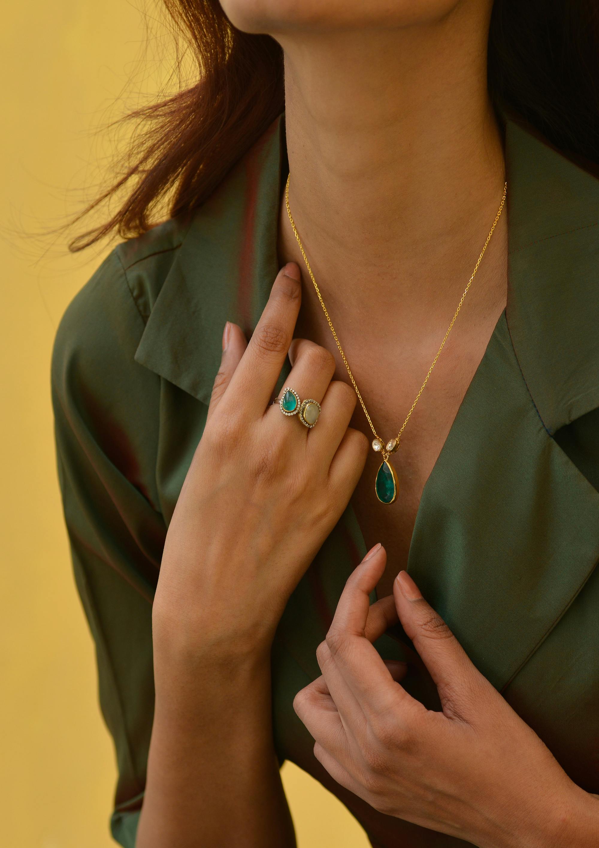 woman wearing dainty opal necklace and ring Jade Bear Gems